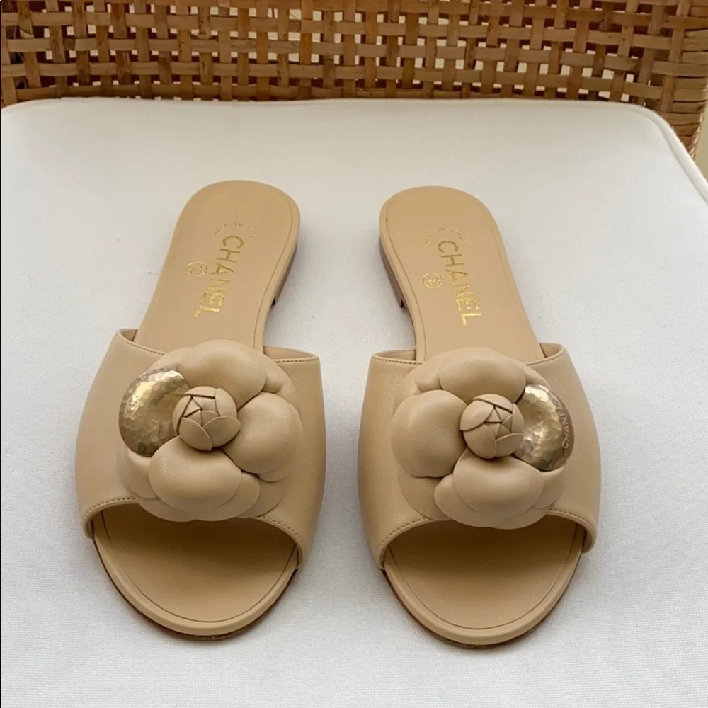CHANEL | Shoes | Chanel Camellia Flat Beige Mules Sandals | Poshmark